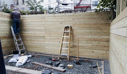 Backyard Fence & paving in Quincy st. Brooklyn, NY completed by Green point construction