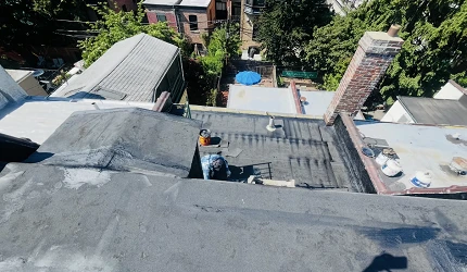 Roof completely replaced with skylight replaced and coating at 25 Rutland Rd, Brooklyn, Ny