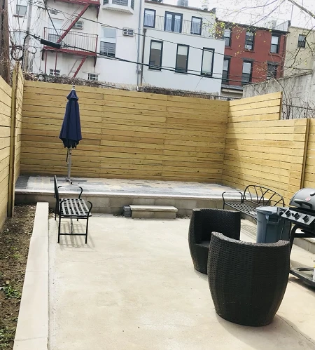 Backyard Fence & paving in Quincy st. Brooklyn, NY completed by Green point construction